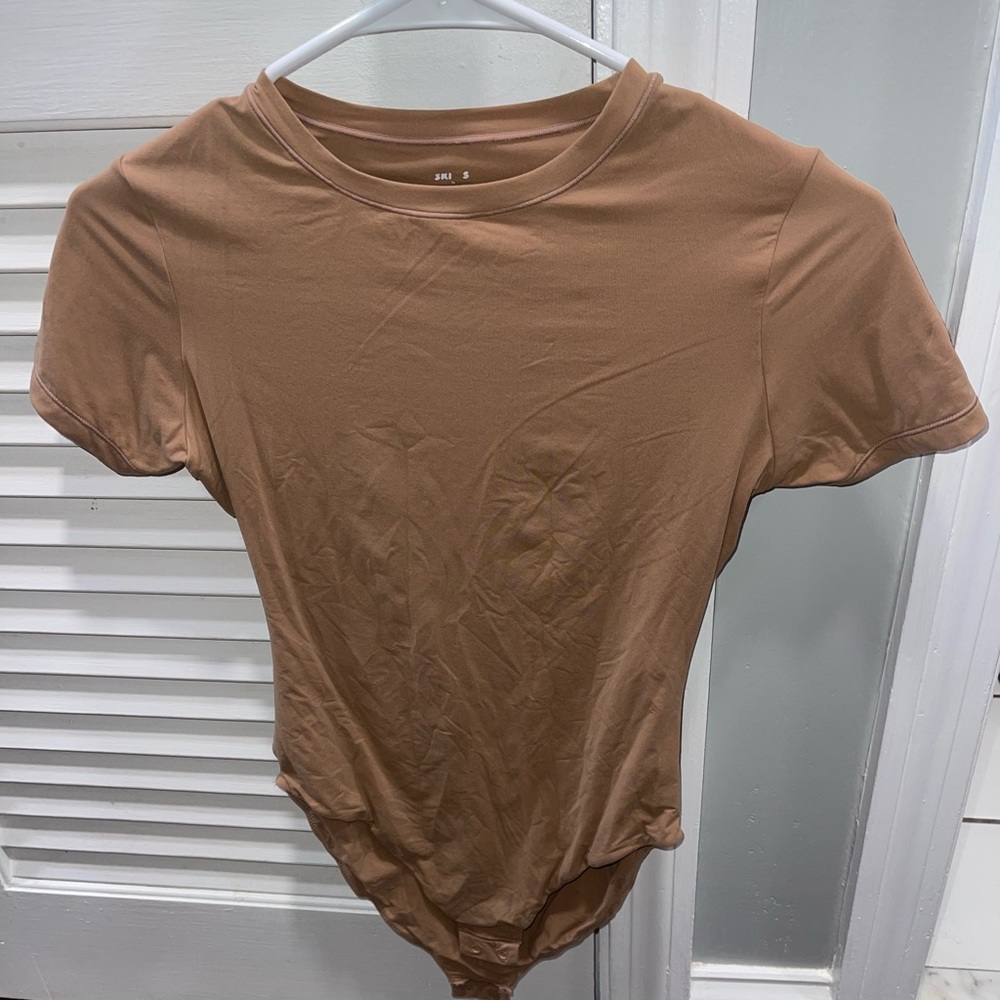 Skims body suit